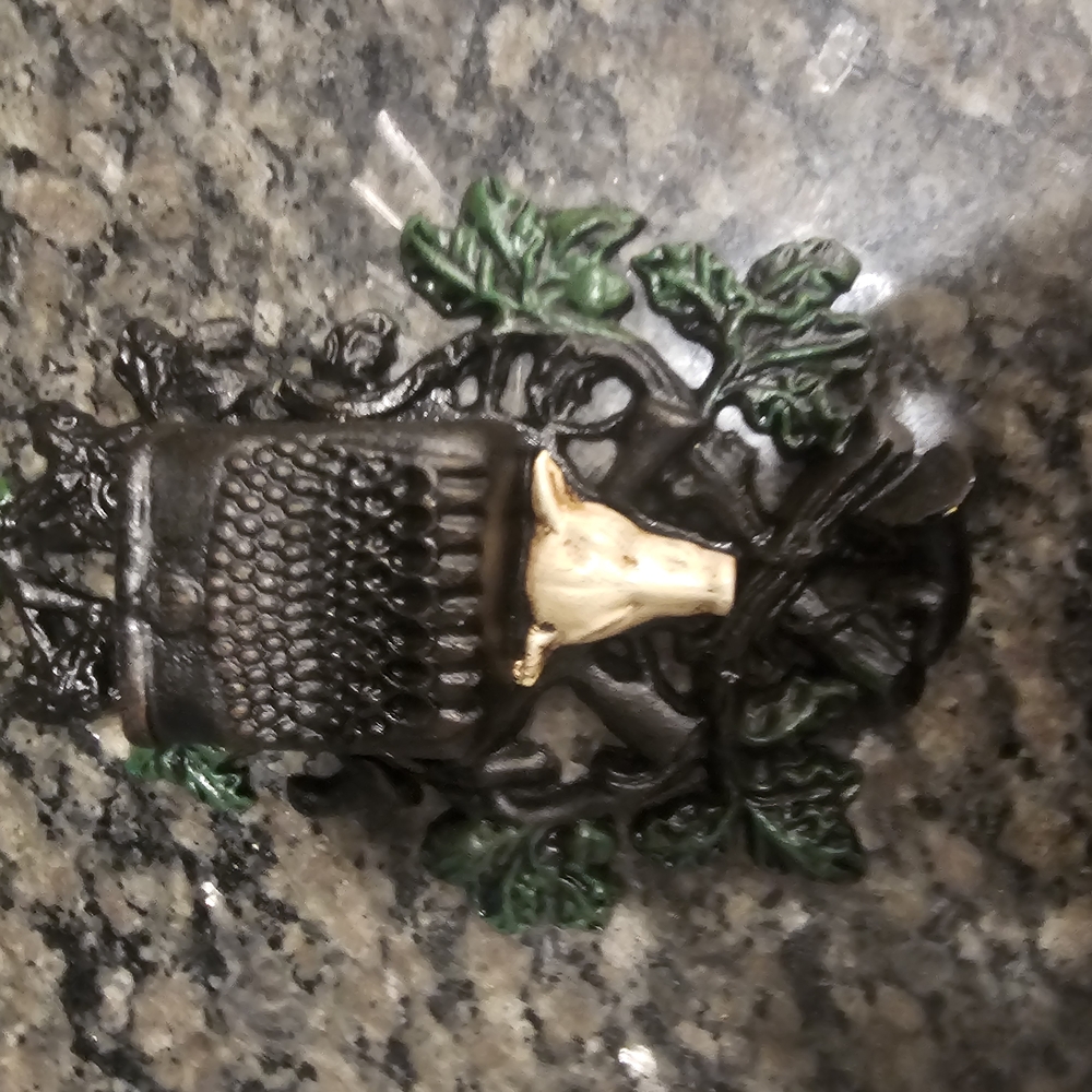 Decorative Wall Plaque with Green and Black Accents
